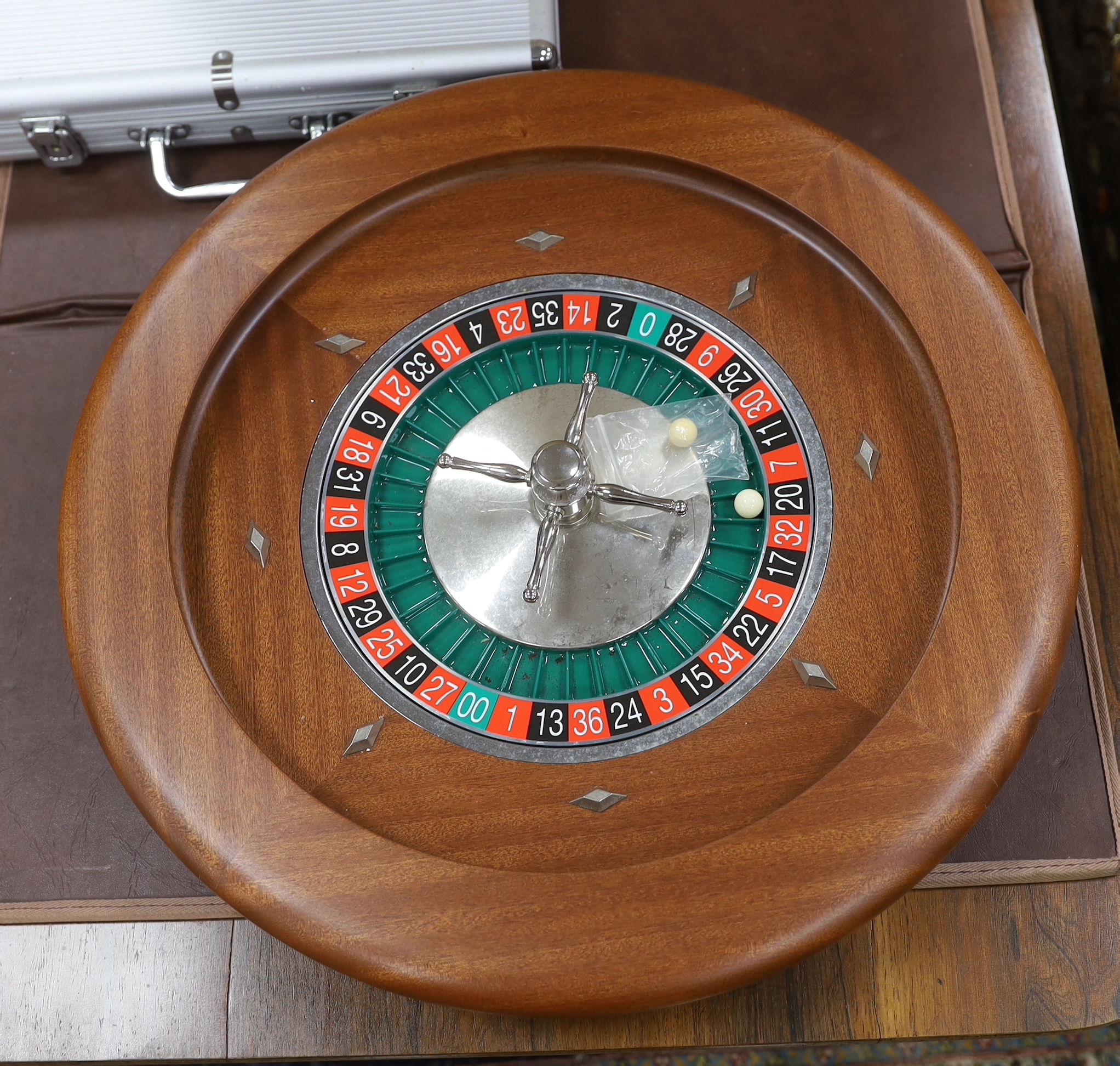 A Dal Negro Montecarlo mahogany roulette wheel with full accessories